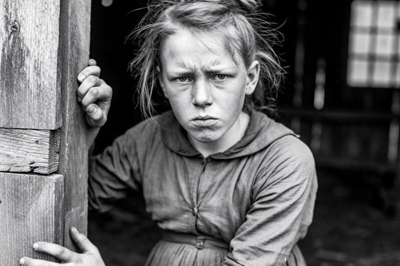Op 9 januari 1916 kroop de elfjarige Lily Mae Tucker over bevroren vuil naar de schuur omdat haar man haar niet wilde horen schreeuwen.